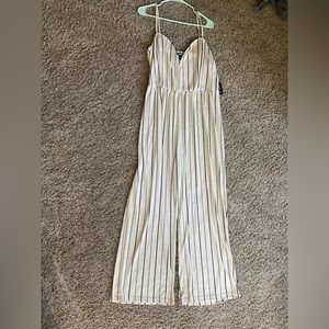 cream and black jumpsuit